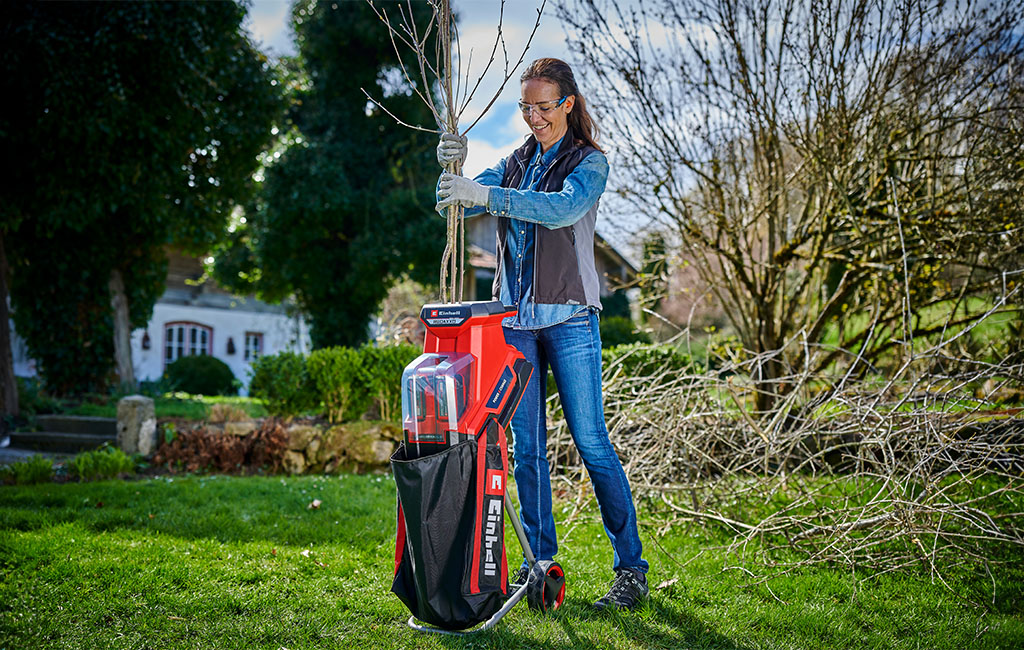 A woman using the cordless shredder.