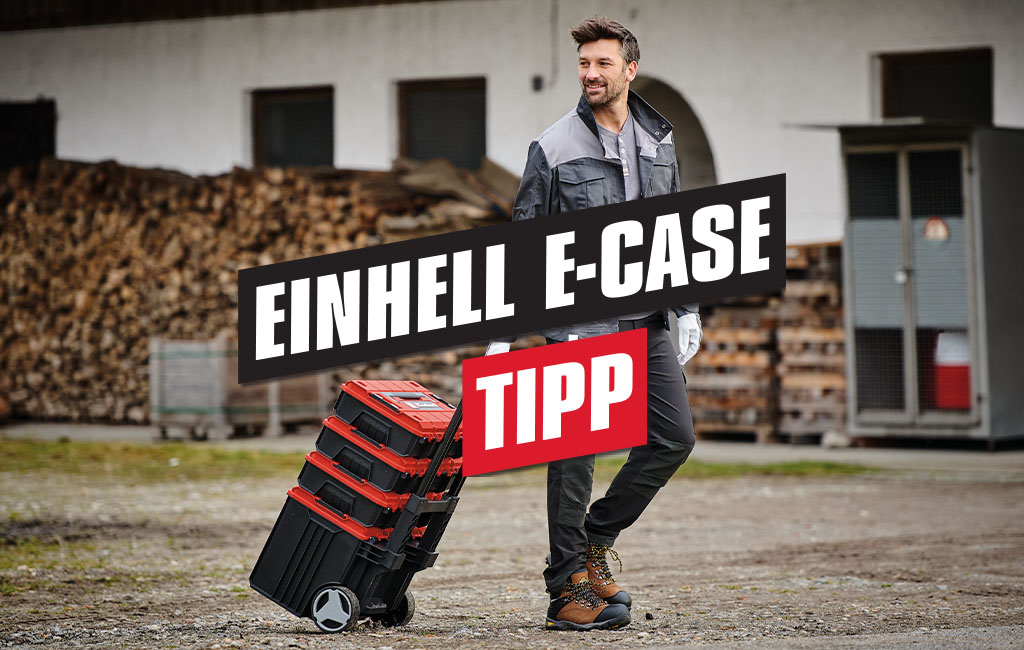 ein Mann zieht den Einhell E-Case Tower hinter sich her