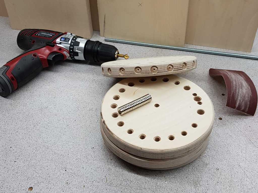 wooden circles with holes in them