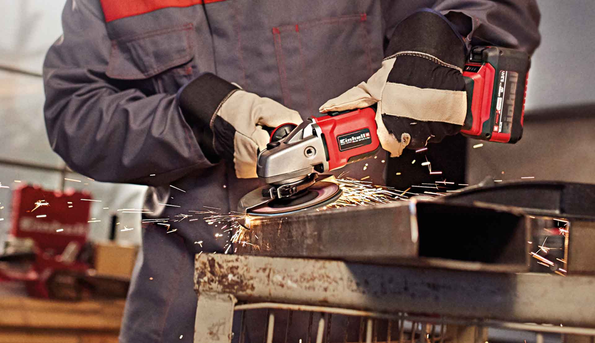 man is working with a angle grinder in his workshop