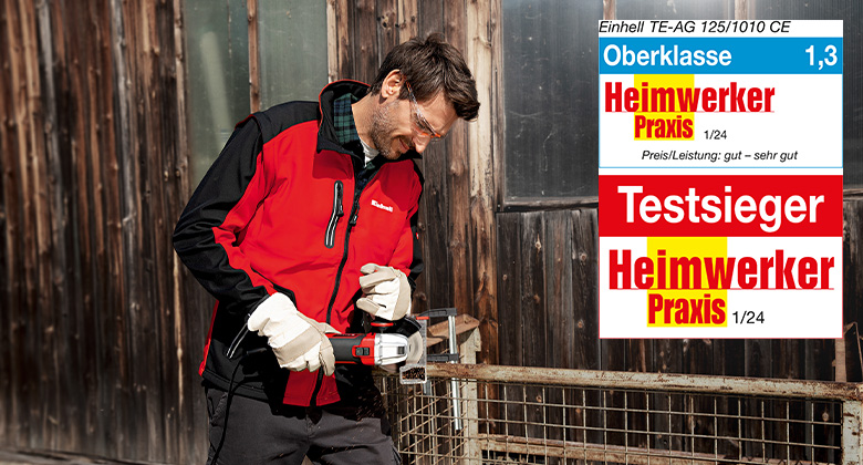 A man uses an Einhell angle grinder outdoors, rated 1.3 and awarded as the top-class test winner by "Heimwerker Praxis" in issue 01/2024.