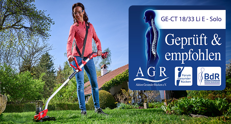 A woman uses an Einhell cordless lawn trimmer, certified and recommended as back-friendly by the AGR (Campaign for Healthier Backs).