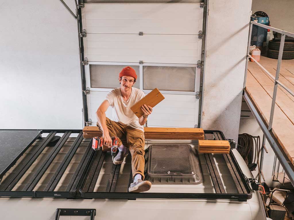 frank with wood and cordless screwdriver