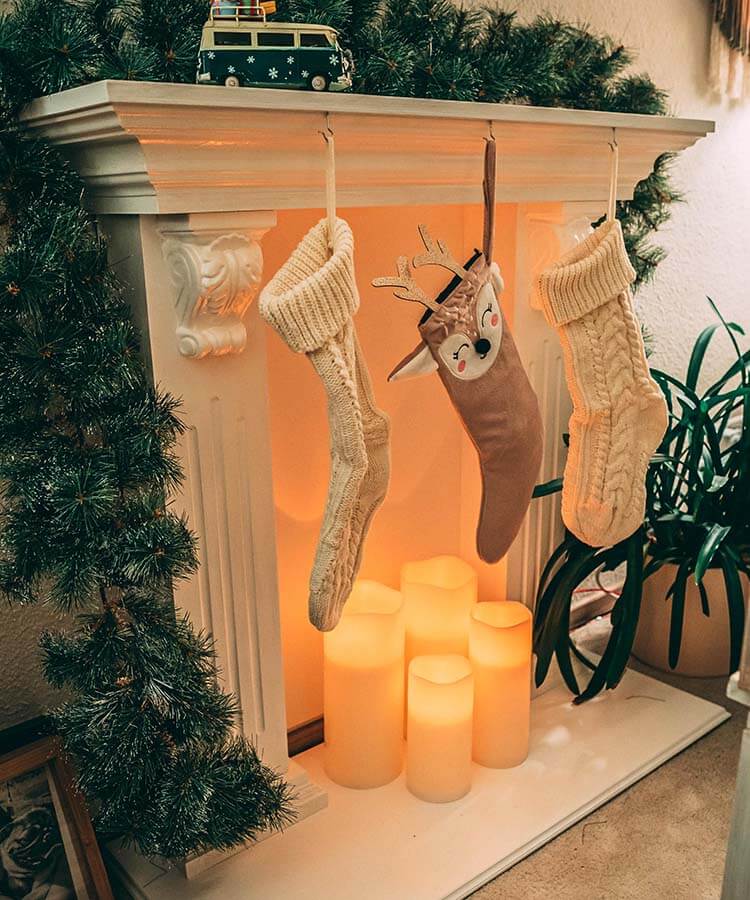 socks hanging from a fake fireplace