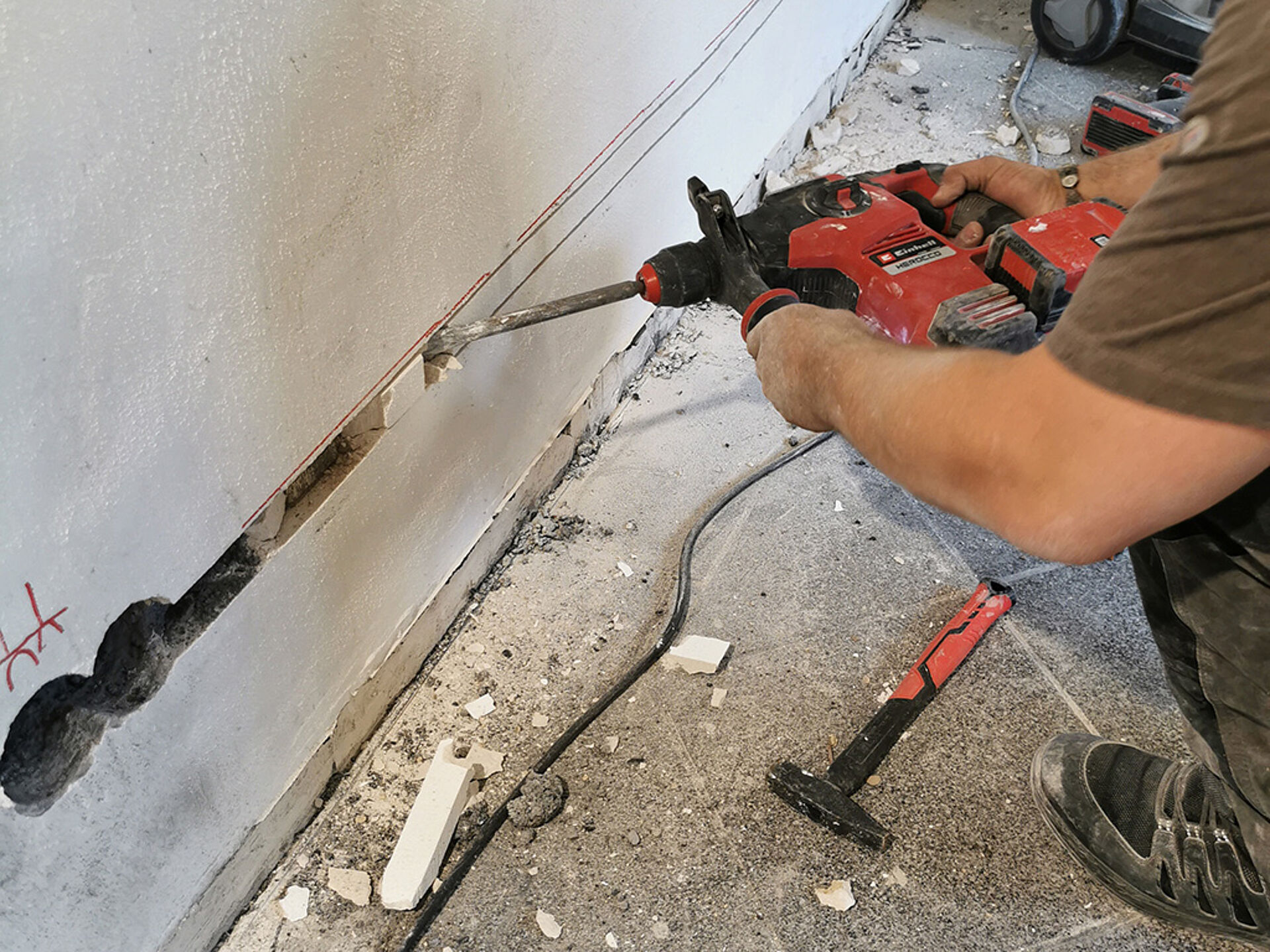 Holes are drilled into the wall